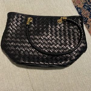 Woven black leather purse